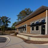 Oak City Academy Photo - Oak City Academy has a beautiful campus filled with natural light and natural materials, creating a warm and inviting environment for learning.